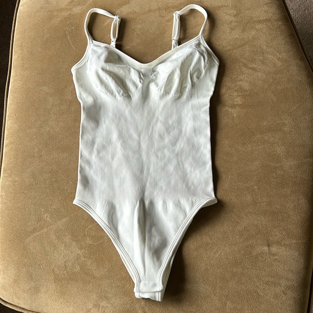 White bodysuit never worn